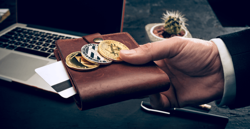 The golden bitcoin in male’s hands